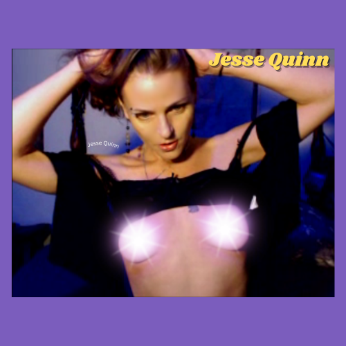 Cam model Jesse Quinn of IndieCamFans has her shirt pulled up, revealing her tits (censored by stars). She is pulling her hair back sexily.