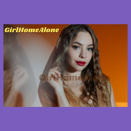 Indiecammodels Girl Next Door Cam Model GirlHomeAlone wearing gold, her sexy big lips painted in red lipstick. She has a seductive look on her face.