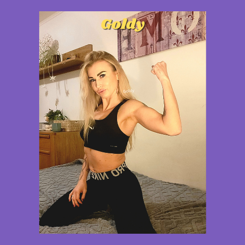 IndieCamModels Girl Next Door Cam Model Goldy IndieCamFans flexing her bicep in gym clothing.